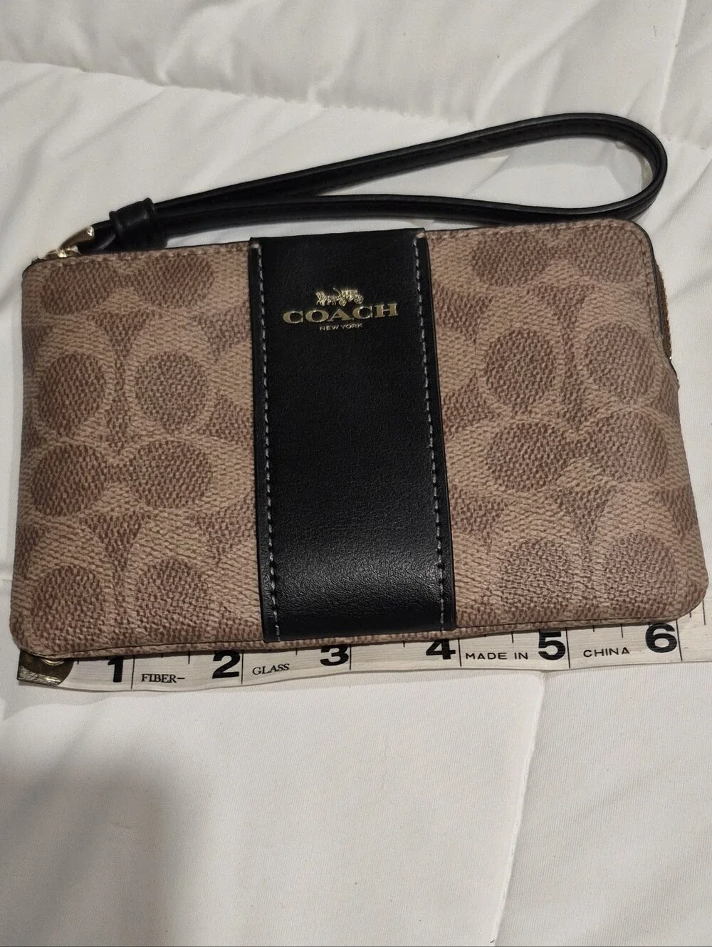 COACH Signature Canvas Wristlet in Brown & Black